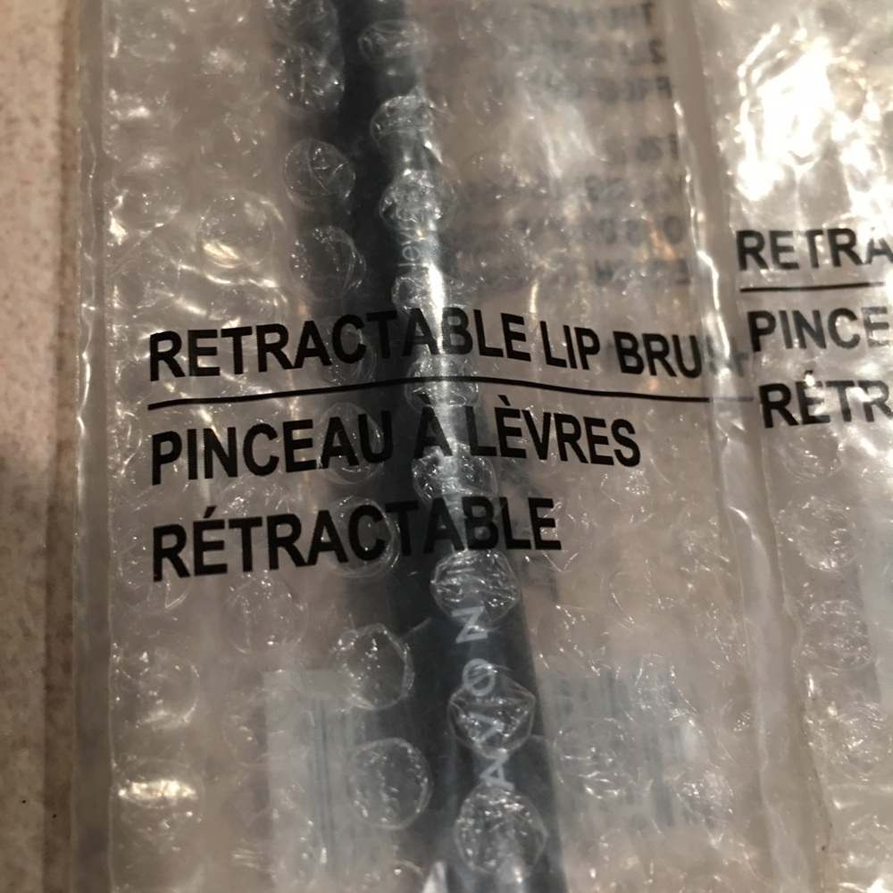 Lot of twoAvonRETRACTABLE Lip Brushes DISCONTINUED